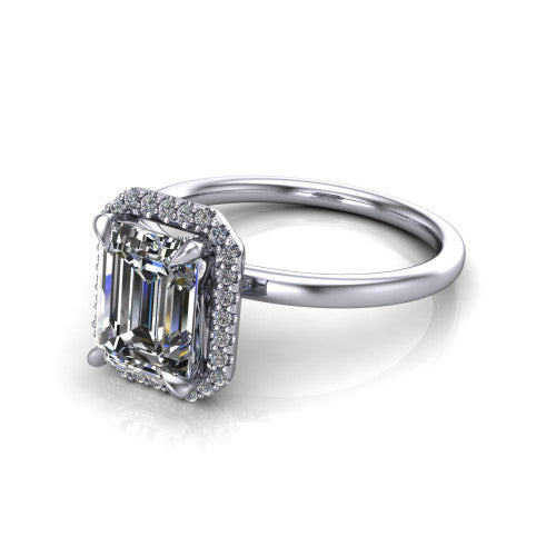 Calista emerald halo engagement ring in 14K White Gold, three-quarter perspective showing the emerald center diamond in a square pave halo with split-claw prongs