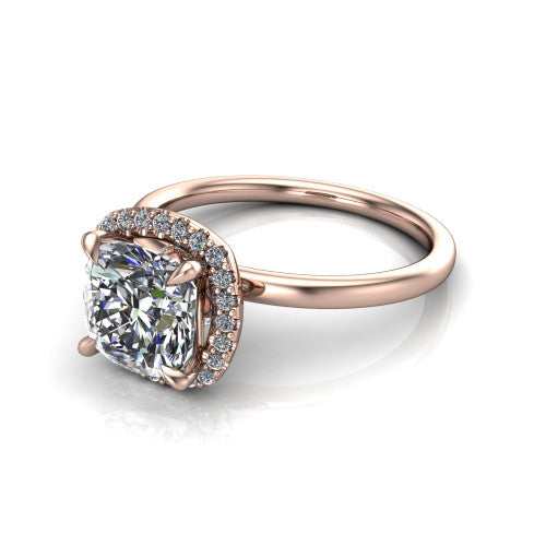 Calista cushion halo engagement ring in 14K Rose Gold, three-quarter perspective showing the cushion center diamond in a square pave halo with split-claw prongs