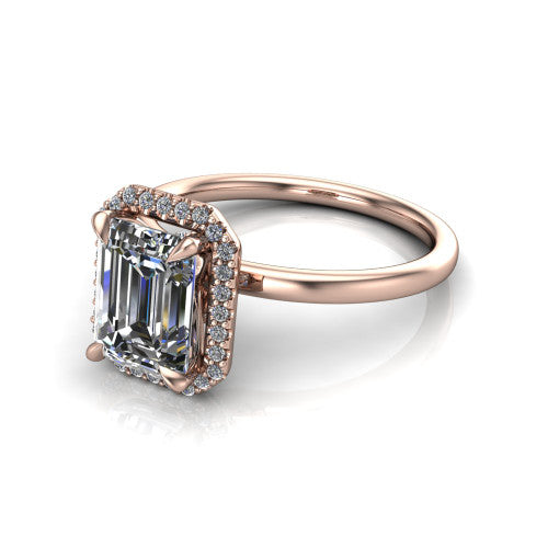 Calista emerald halo engagement ring in 18K Rose Gold, three-quarter perspective showing the emerald center diamond in a square pave halo with split-claw prongs