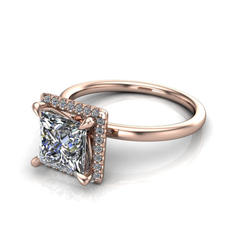 Calista princess halo engagement ring in 18K Rose Gold, three-quarter perspective showing the princess center diamond in a square pave halo with split-claw prongs