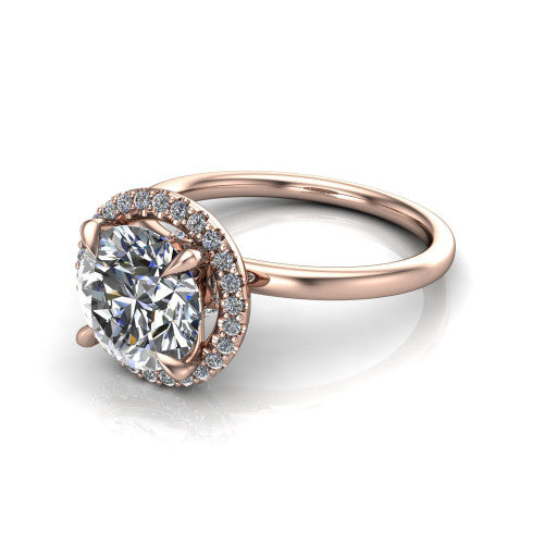 Calista round halo engagement ring in 14K Rose Gold, three-quarter perspective showing the round center diamond in a square pave halo with split-claw prongs