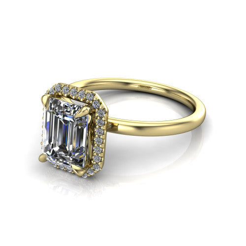 Calista emerald halo engagement ring in 14K Yellow Gold, three-quarter perspective showing the emerald center diamond in a square pave halo with split-claw prongs