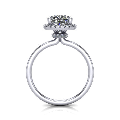 Calista cushion halo engagement ring in Platinum, through-finger front profile showing the under-halo detail and thin band