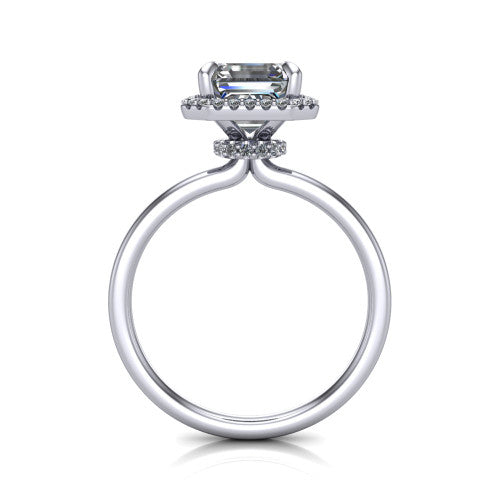 Calista square emerald halo engagement ring in Platinum, through-finger front profile showing the under-halo detail and thin band