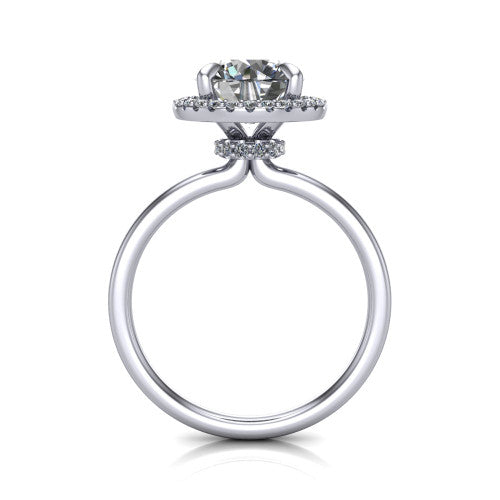 Calista round halo engagement ring in Platinum, through-finger front profile showing the under-halo detail and thin band