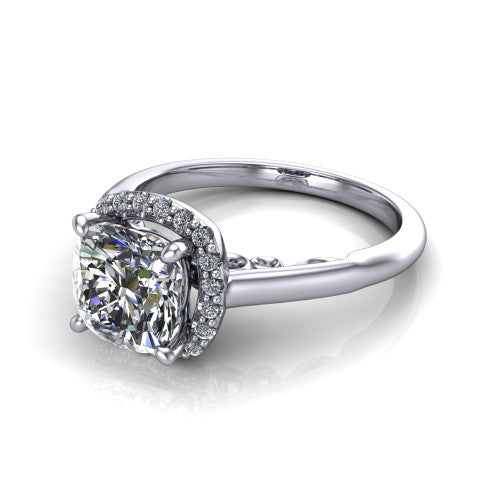 Paige cushion halo engagement ring in Platinum, three-quarter perspective showing the cushion center diamond in a pave halo above a polished band