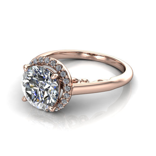 Paige round halo engagement ring in 18K Rose Gold, three-quarter perspective showing the round center diamond in a pave halo above a polished band