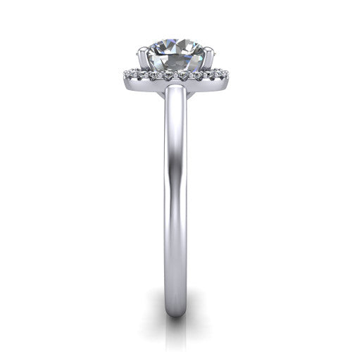 Paige round halo engagement ring in Platinum, side profile showing the vintage bridge detail and polished band