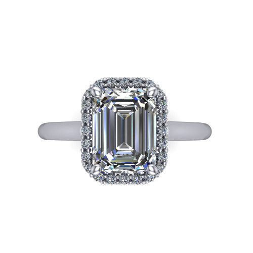 Paige emerald halo engagement ring in Platinum, top-down view showing the emerald center diamond framed by a pave halo