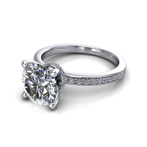 Renata round hidden halo engagement ring in Platinum, three-quarter perspective showing the round center diamond, 4-prong setting, and pave band