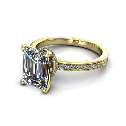 Renata emerald hidden halo engagement ring in 14K Yellow Gold, three-quarter perspective showing the emerald center diamond, 4-prong setting, and pave band