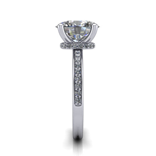 Renata oval hidden halo engagement ring in Platinum, side profile showing the hidden pave halo and pave band