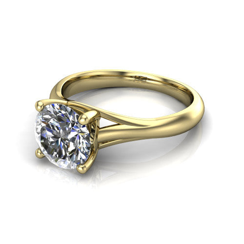 Francesca round solitaire engagement ring in 18K Yellow Gold, three-quarter perspective showing the round center diamond, double-claw prongs, and split shank