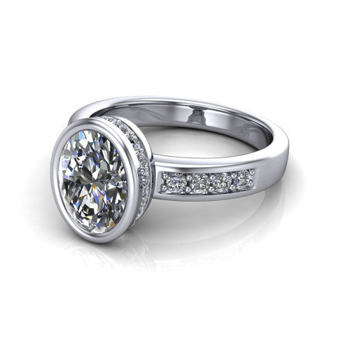 Astrid oval hidden halo engagement ring in Platinum, three-quarter perspective showing the bezel-set oval center diamond, hidden halo, and pavé band