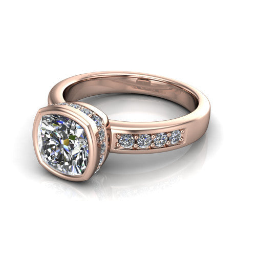 Astrid cushion-cut hidden halo engagement ring in 14K Rose Gold, three-quarter perspective showing the bezel-set cushion-cut center diamond, hidden halo, and pavé band
