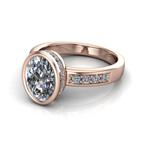 Astrid oval hidden halo engagement ring in 18K Rose Gold, three-quarter perspective showing the bezel-set oval center diamond, hidden halo, and pavé band