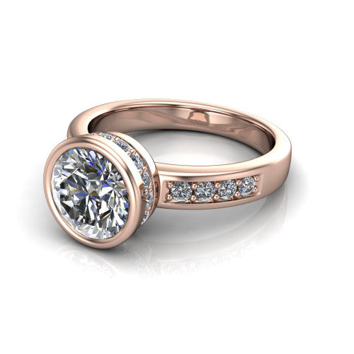 Astrid round hidden halo engagement ring in 14K Rose Gold, three-quarter perspective showing the bezel-set round center diamond, hidden halo, and pavé band