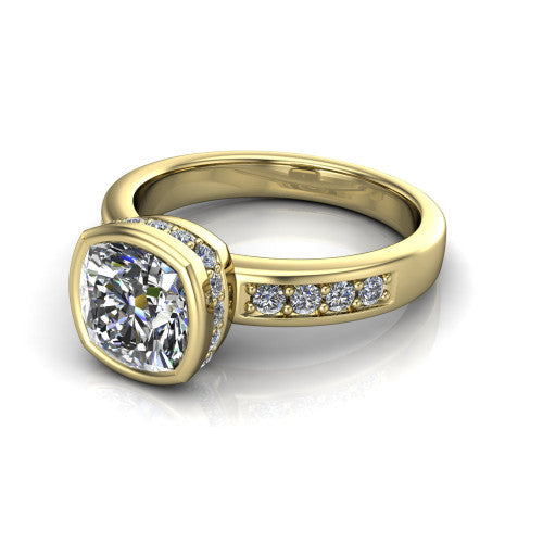 Astrid cushion-cut hidden halo engagement ring in 14K Yellow Gold, three-quarter perspective showing the bezel-set cushion-cut center diamond, hidden halo, and pavé band