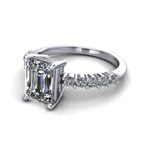 Fernanda emerald solitaire engagement ring in 14K White Gold, three-quarter perspective showing the emerald center diamond, 4-prong setting, and shared-prong pave band