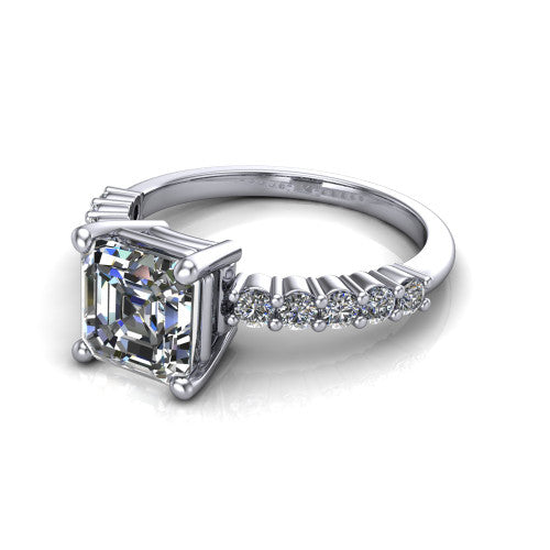 Fernanda square emerald solitaire engagement ring in 18K White Gold, three-quarter perspective showing the square emerald center diamond, 4-prong setting, and shared-prong pave band