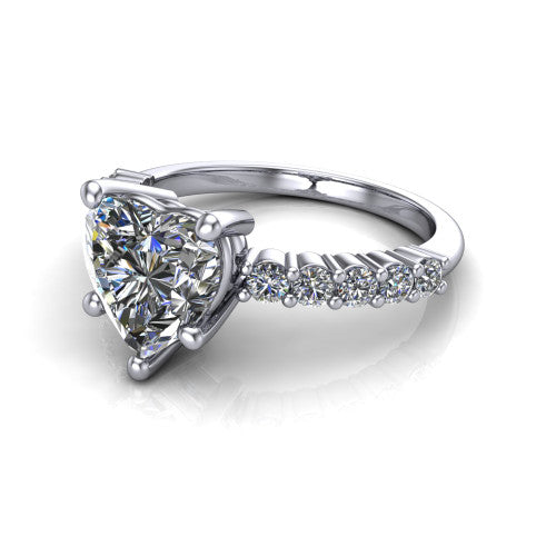 Fernanda heart solitaire engagement ring in 18K White Gold, three-quarter perspective showing the heart center diamond, 4-prong setting, and shared-prong pave band