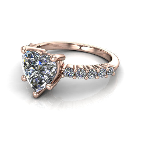 Fernanda heart solitaire engagement ring in 14K Rose Gold, three-quarter perspective showing the heart center diamond, 4-prong setting, and shared-prong pave band