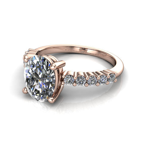 Fernanda oval solitaire engagement ring in 14K Rose Gold, three-quarter perspective showing the oval center diamond, 4-prong setting, and shared-prong pave band