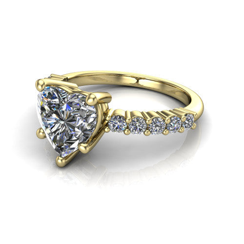 Fernanda heart solitaire engagement ring in 14K Yellow Gold, three-quarter perspective showing the heart center diamond, 4-prong setting, and shared-prong pave band