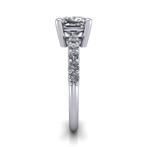Fernanda cushion solitaire engagement ring in 14K White Gold, side profile showing the 4-prong head and shared-prong pave band