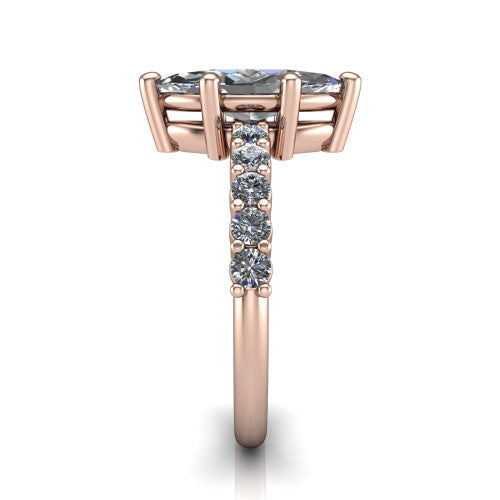 Fernanda marquise solitaire engagement ring in 18K Rose Gold, side profile showing the 4-prong head and shared-prong pave band