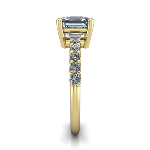 Fernanda square emerald solitaire engagement ring in 14K Yellow Gold, side profile showing the 4-prong head and shared-prong pave band