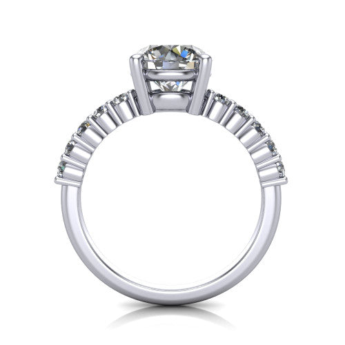 Fernanda round solitaire engagement ring in 18K White Gold, through-finger front profile showing the open gallery and pave shoulders