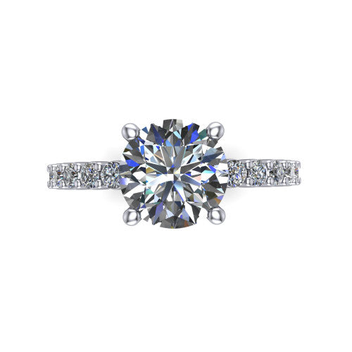 Fernanda round solitaire engagement ring in 18K White Gold, top-down view showing the round center diamond and pave band