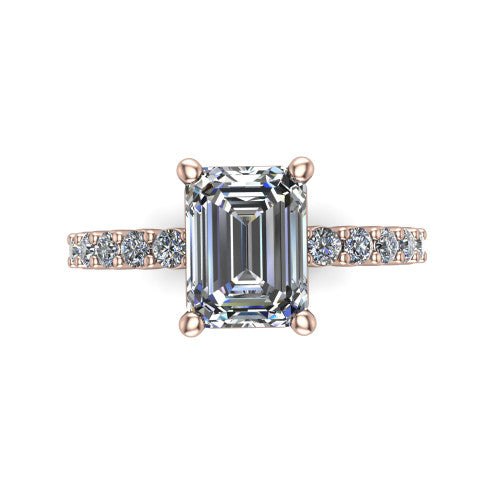 Fernanda emerald solitaire engagement ring in 14K Rose Gold, through-finger front profile showing the open gallery and pave shoulders