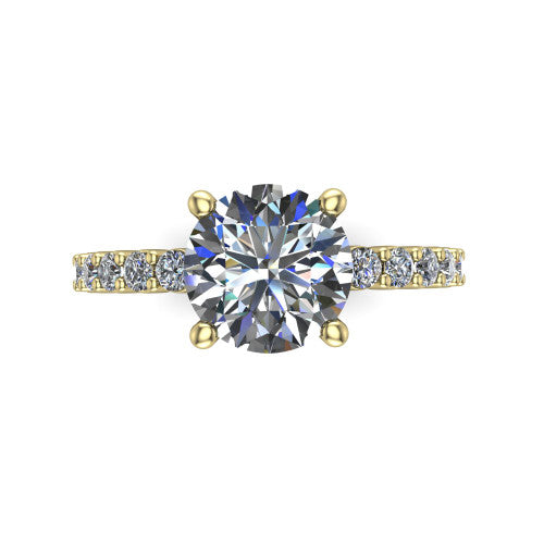 Fernanda round solitaire engagement ring in 18K Yellow Gold, top-down view showing the round center diamond and pave band