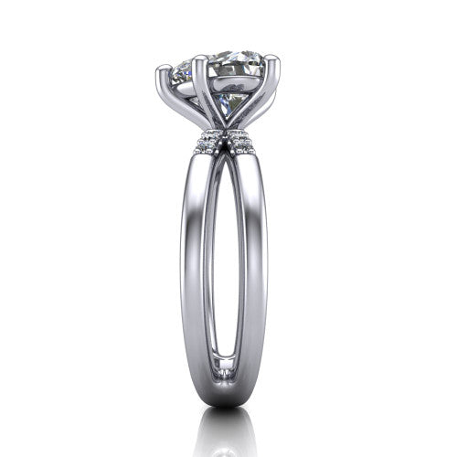 Raven heart solitaire engagement ring in 18K White Gold, side profile showing the accent diamonds along the dual band