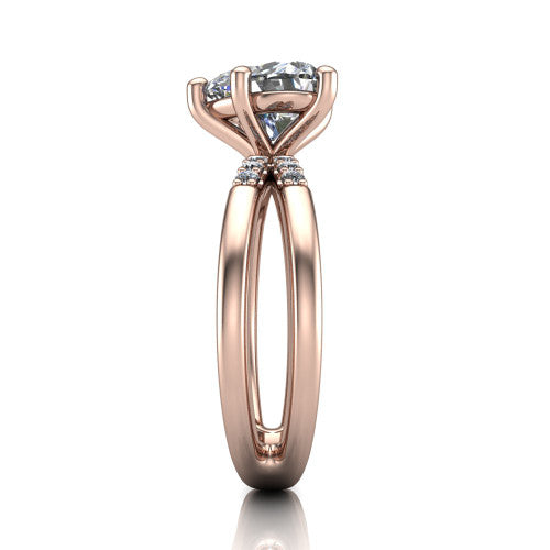 Raven heart solitaire engagement ring in 14K Rose Gold, side profile showing the accent diamonds along the dual band