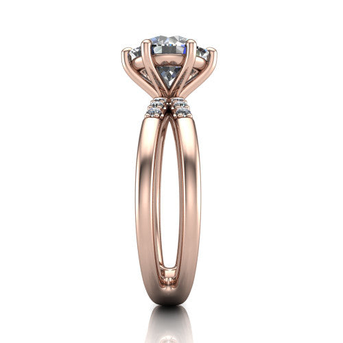 Raven round solitaire engagement ring in 18K Rose Gold, side profile showing the accent diamonds along the dual band