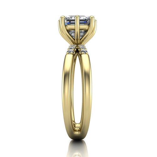 Raven square emerald solitaire engagement ring in 18K Yellow Gold, side profile showing the accent diamonds along the dual band