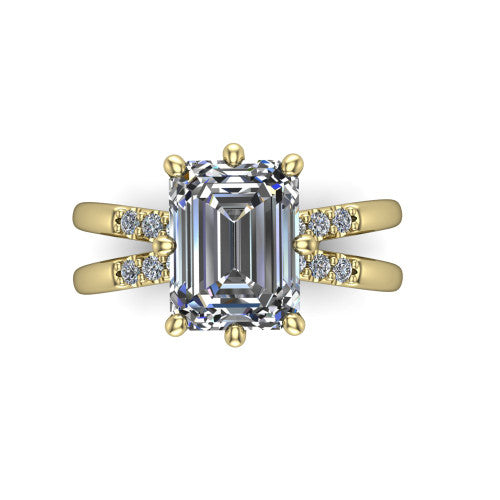 Raven emerald solitaire engagement ring in 14K Yellow Gold, top-down view showing the six-prong emerald center diamond and split shank