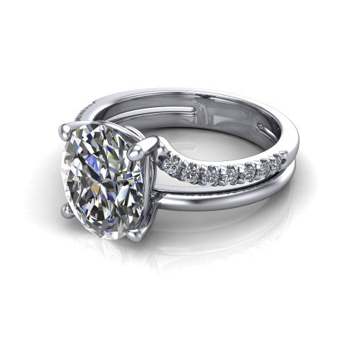 Fiona oval solitaire engagement ring in Platinum, three-quarter perspective showing the oval center diamond above a split dual-line band