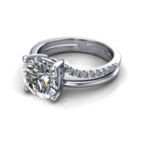 Fiona round solitaire engagement ring in Platinum, three-quarter perspective showing the round center diamond above a split dual-line band