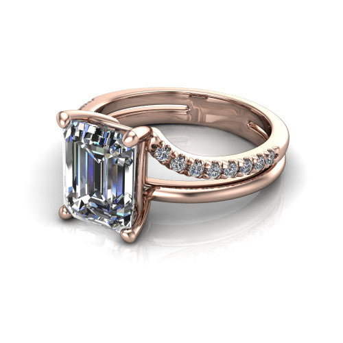 Fiona emerald solitaire engagement ring in 18K Rose Gold, three-quarter perspective showing the emerald center diamond above a split dual-line band