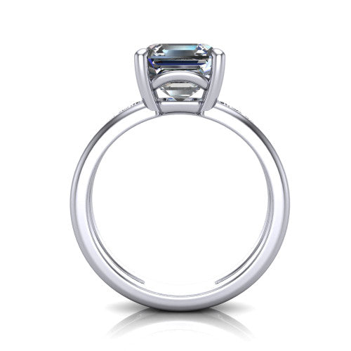 Fiona square emerald solitaire engagement ring in Platinum, through-finger front profile showing the open cathedral basket