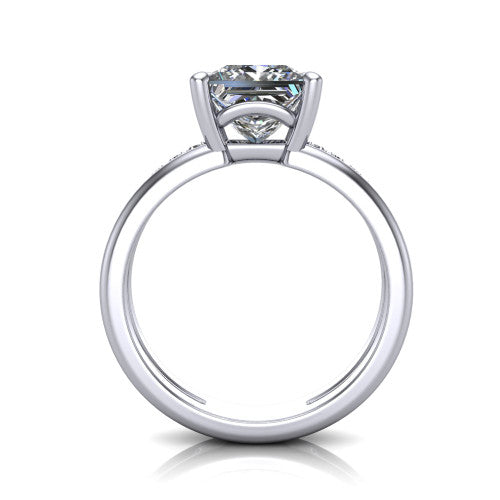 Fiona princess solitaire engagement ring in Platinum, through-finger front profile showing the open cathedral basket