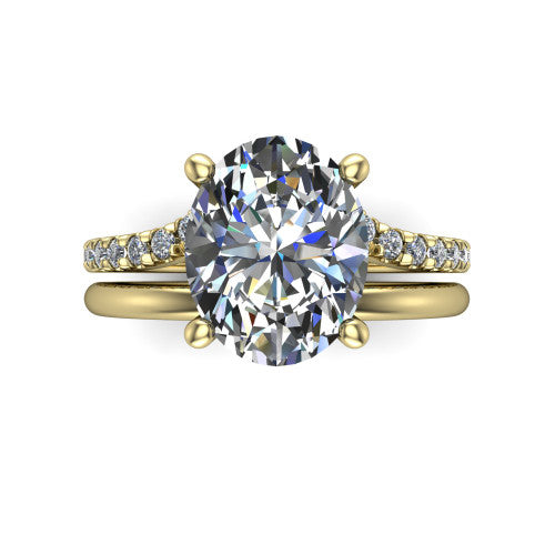 Fiona oval solitaire engagement ring in 18K Yellow Gold, top-down view showing the four-prong oval center diamond