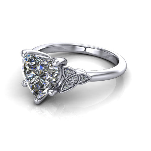 Lilith heart solitaire engagement ring in Platinum, three-quarter perspective showing the heart center diamond with Celtic knot shoulders