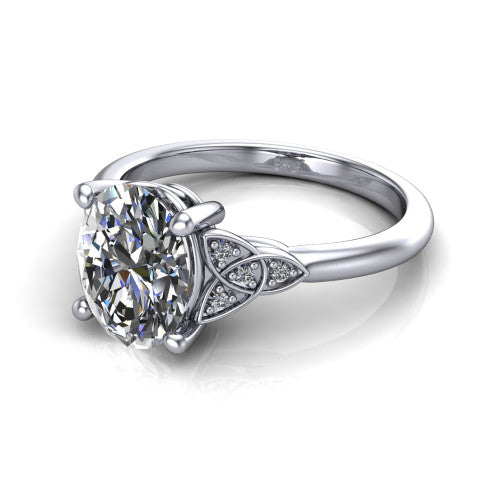 Lilith oval solitaire engagement ring in Platinum, three-quarter perspective showing the oval center diamond with Celtic knot shoulders