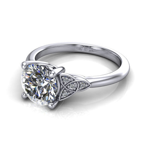 Lilith round solitaire engagement ring in 18K White Gold, three-quarter perspective showing the round center diamond with Celtic knot shoulders