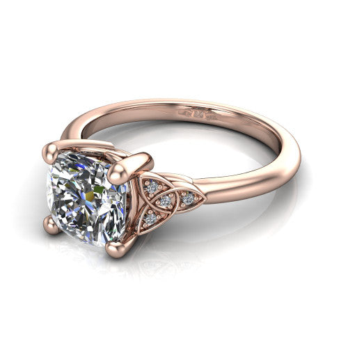 Lilith cushion solitaire engagement ring in 14K Rose Gold, three-quarter perspective showing the cushion center diamond with Celtic knot shoulders